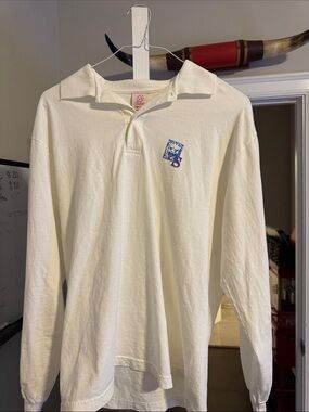 Cream Polo Shirt with Blue & Pink Lion Patch